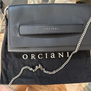 Genuine leather clutch and crossbody